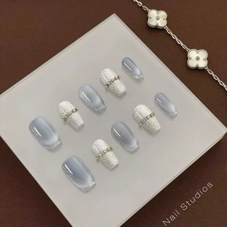 hand-crafted and polished blue nail